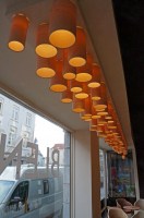 bespoke ceiling lights in maple wood for a wine bar in bruge - Blend